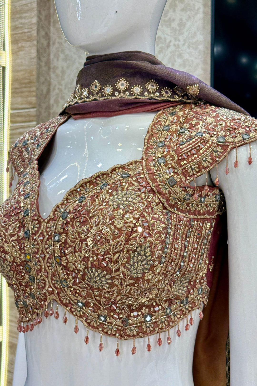 Designer Lehenga with Intricate Mirror, Stone, Sequins, Zari and Beads work
