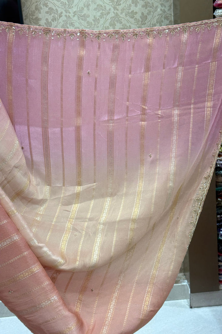 Elegant Pink and Peach Saree with Golden Zari Stripe Detailing