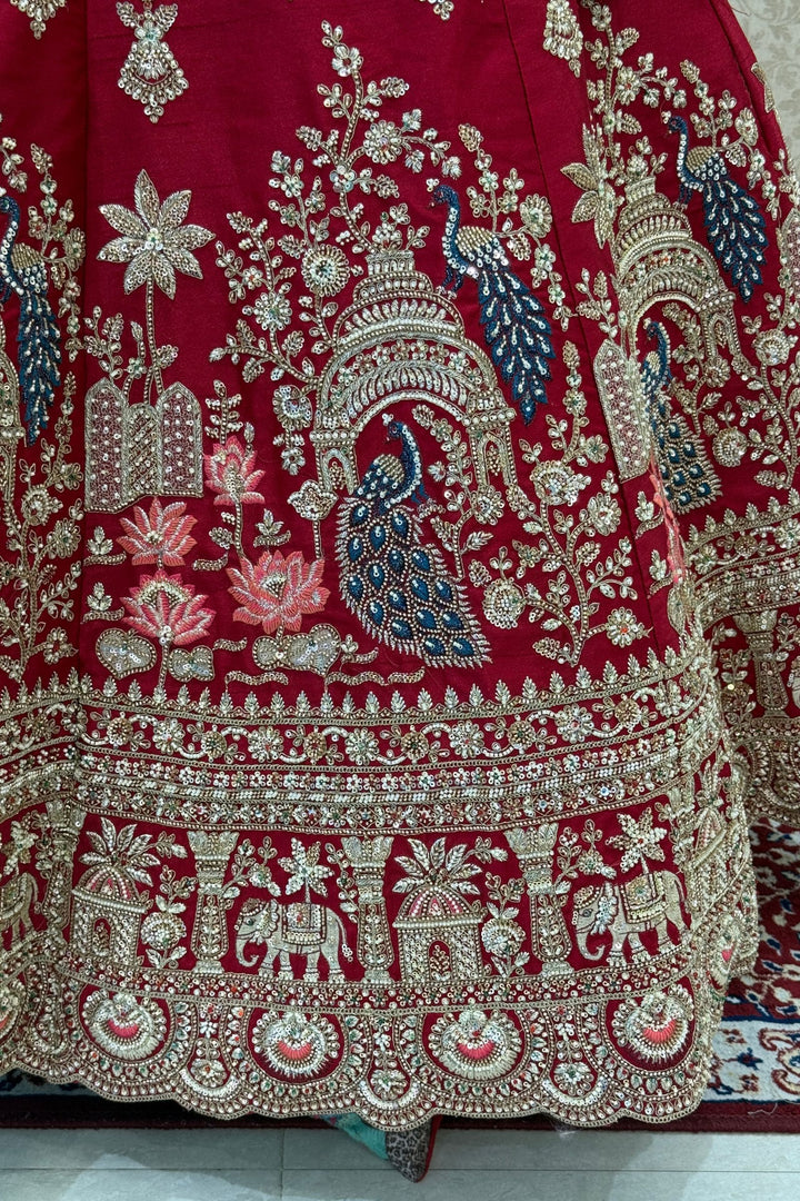 Red Beads, Sequins and Zari work Bridal Lehenga with Intricate Peacock and Elephant Motifs