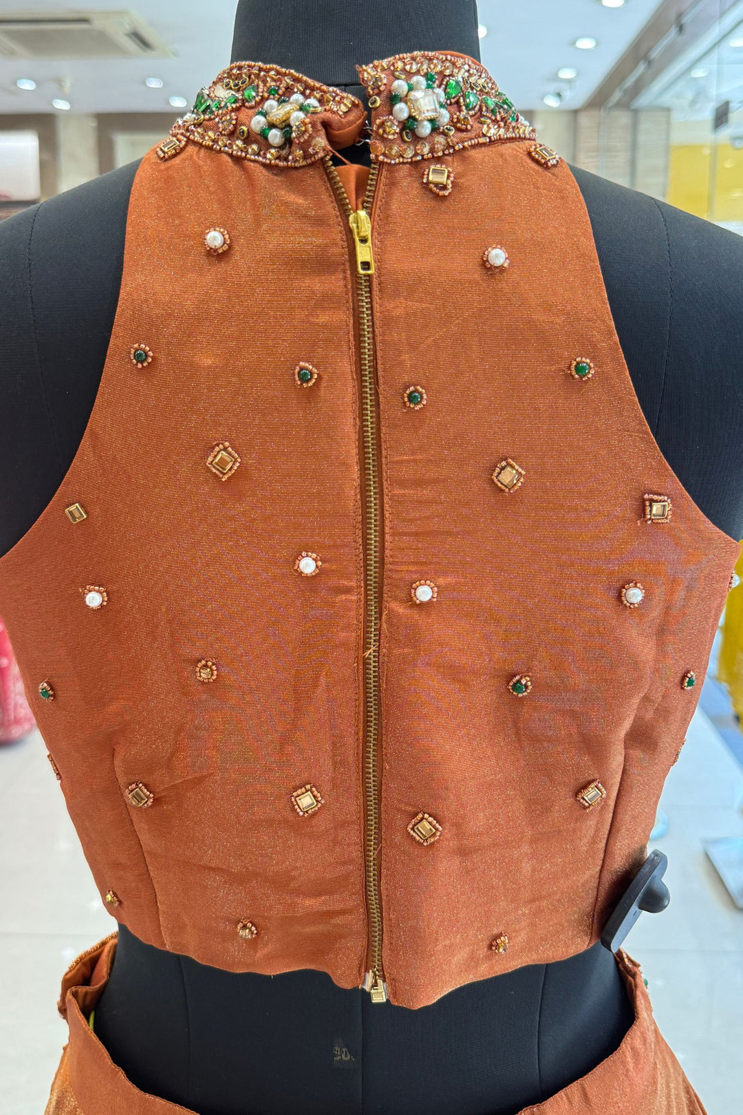 Rust Beads, Zardozi, Stone, Sequins and Pearl work with Halter Neck Crop Top Lehenga