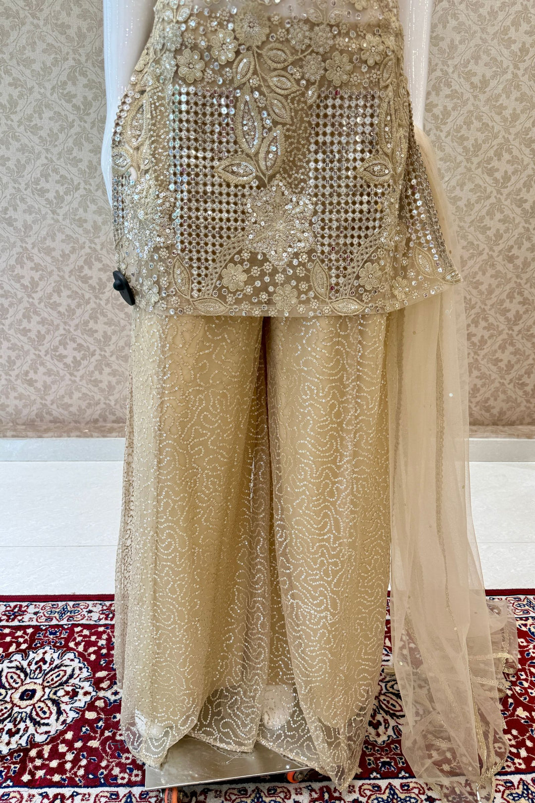 Gold Halter Neck Palazzo Salwar Suit with Sequins, Zari and Embroidery Detailing