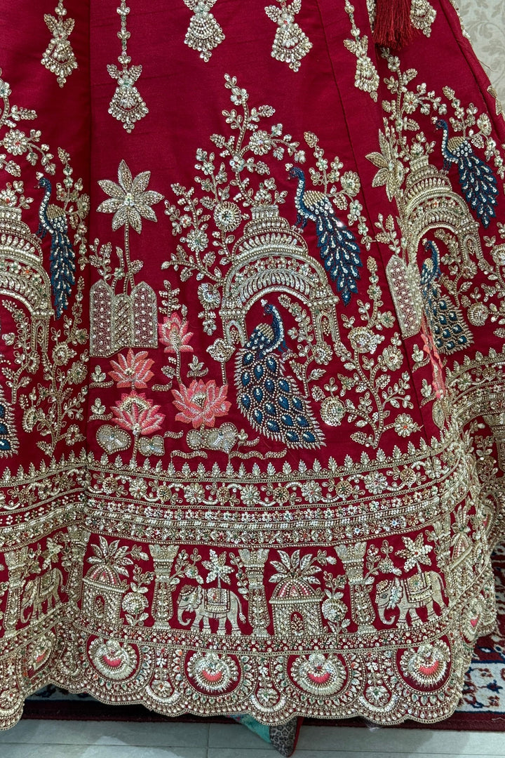 Red Beads, Sequins and Zari work Bridal Lehenga with Intricate Peacock and Elephant Motifs