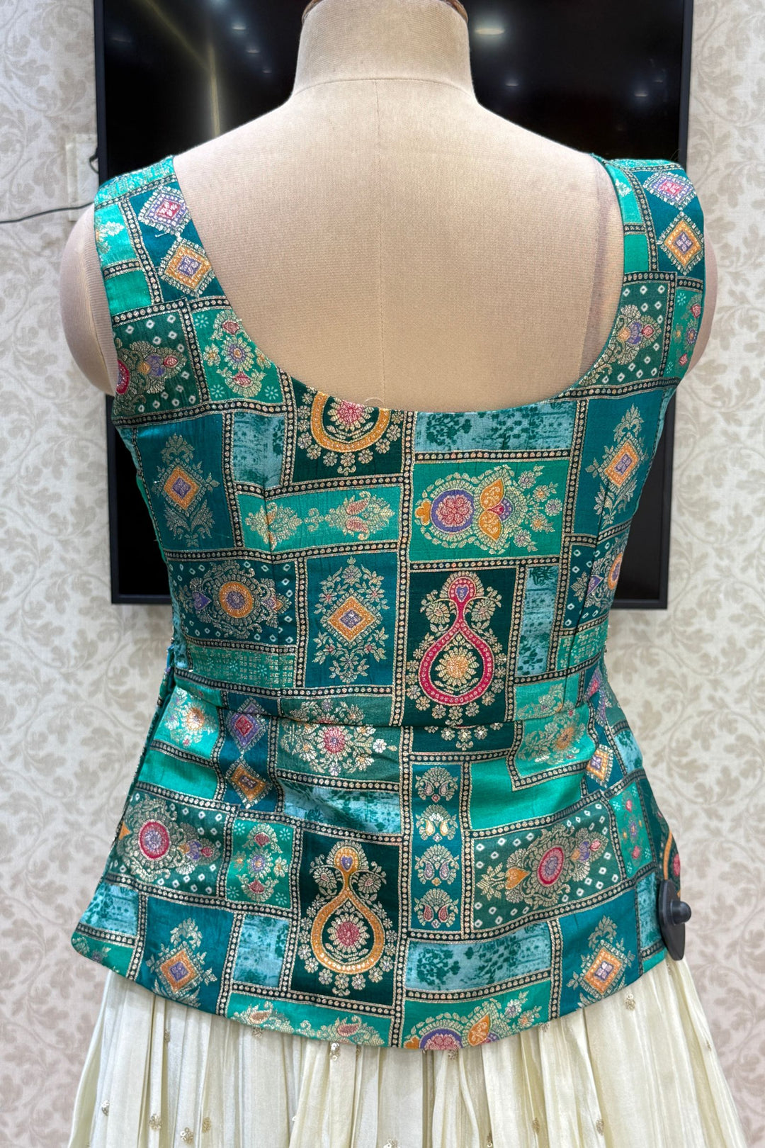 Green with Cream Banaras, Beads, Sequins, Zari and Stone work Peplum Style Lehenga