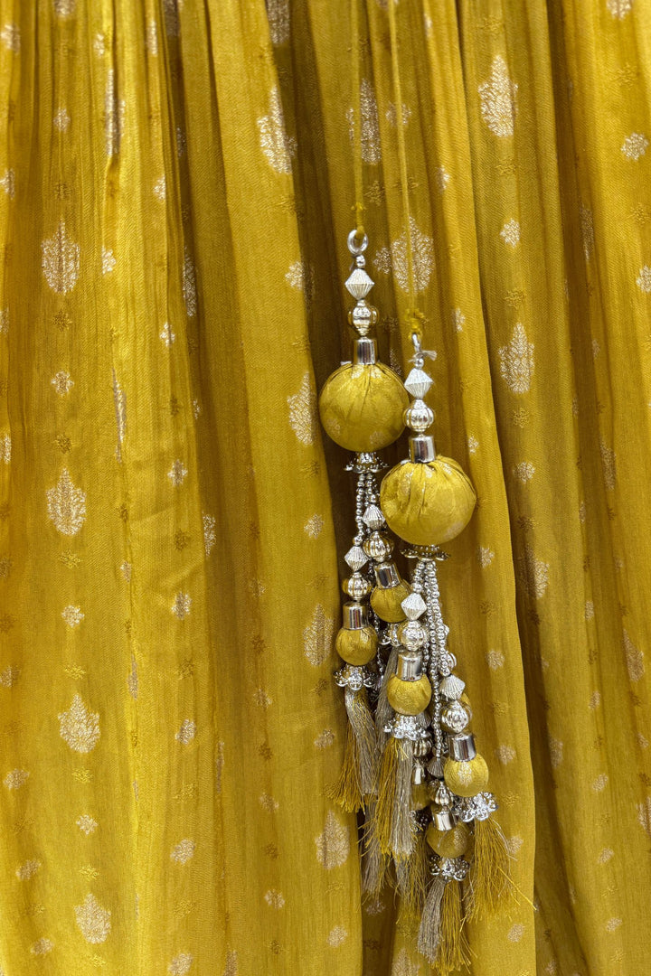 Yellow Jacquard, Mirror, Stone, Sequins, Beads and Banaras work Peplum Style Lehenga