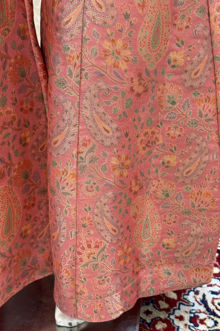 Peach Halter Neck Palazzo Salwar Suit with Multicolor Brocade and Sequins Detailing