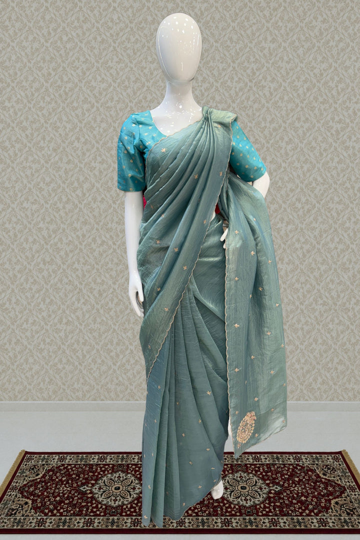Sea Green Shimmer Tissue Saree with Scalloped Zari Border