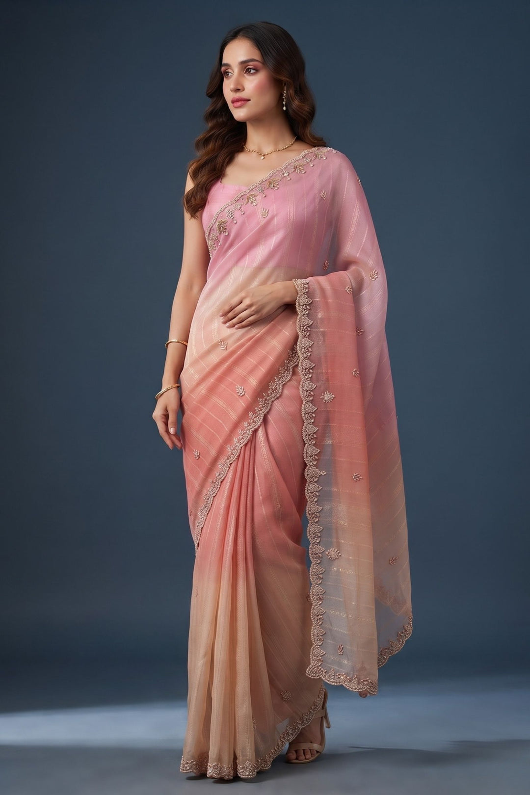 Elegant Pink and Peach Saree with Golden Zari Stripe Detailing