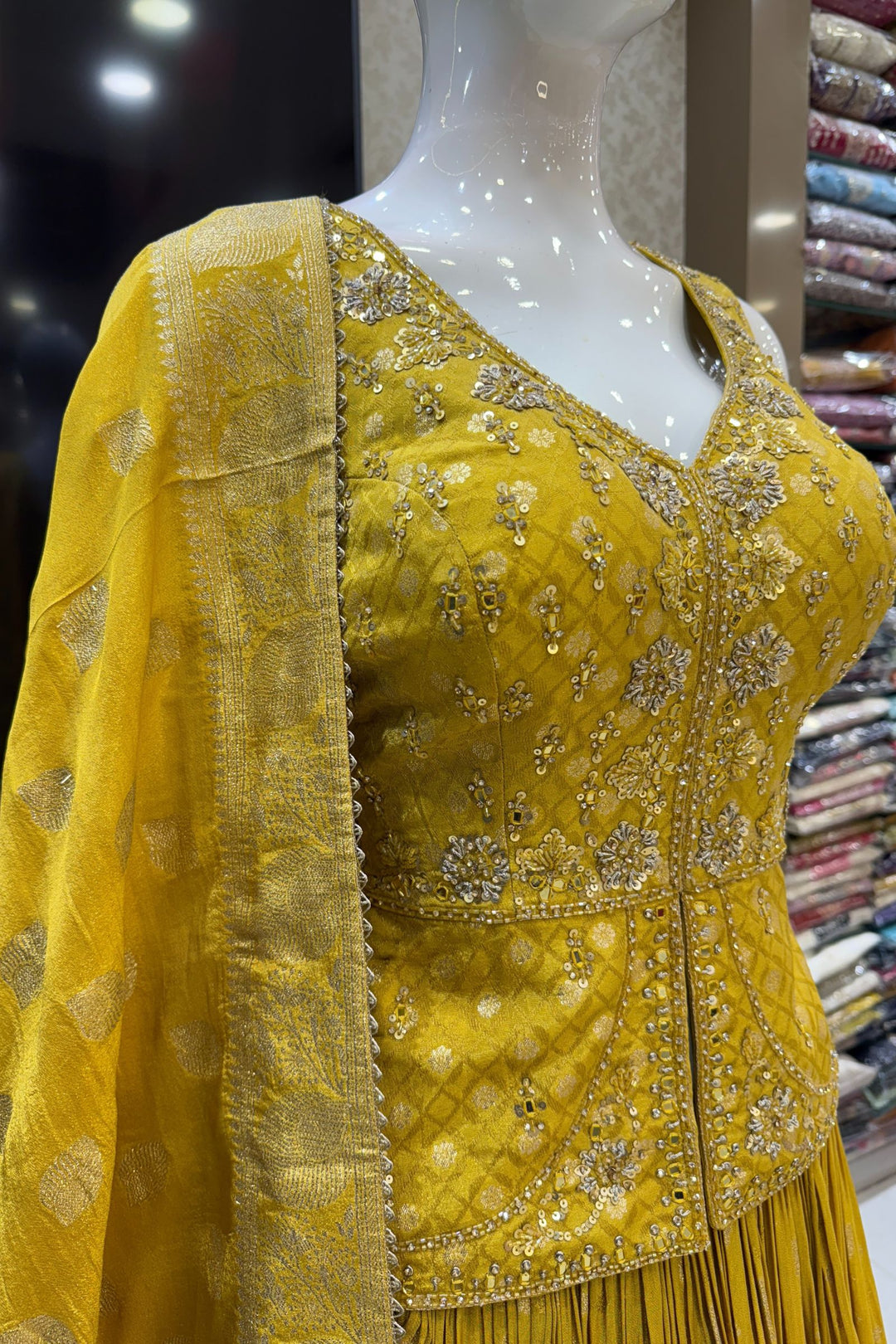 Yellow Jacquard, Mirror, Stone, Sequins, Beads and Banaras work Peplum Style Lehenga