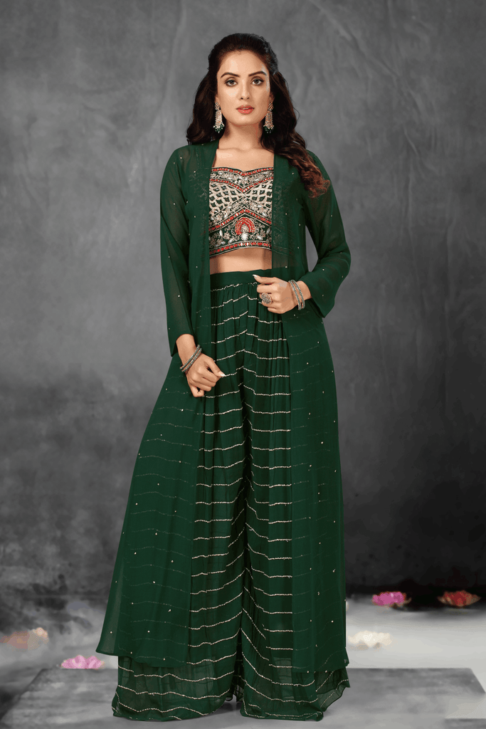 Granite green crop top and flared palazzo set in mirror work embroidery.