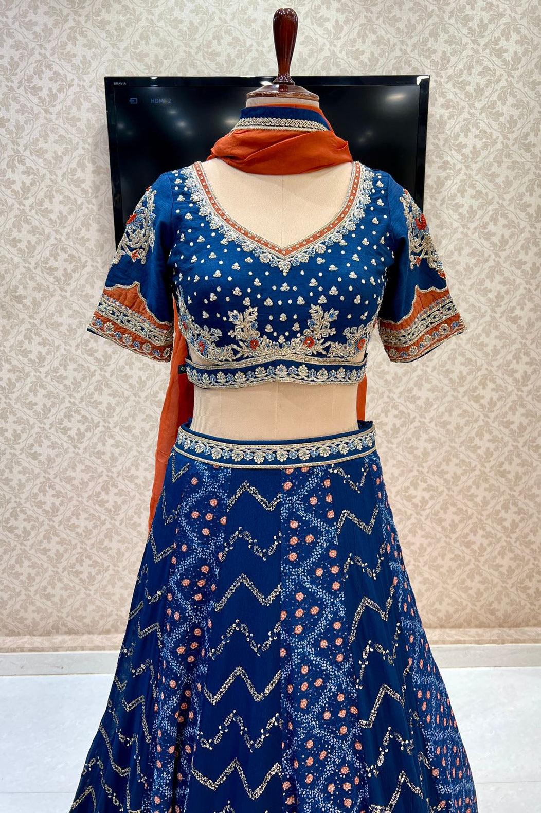 Elegant Blue Lehenga With Orange Dupatta at best price in Ghaziabad | ID:  14001884062
